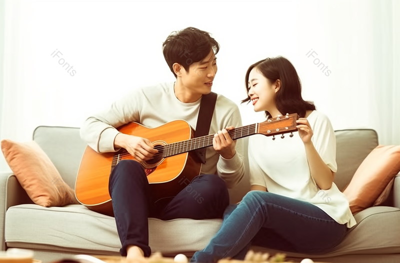青年情侣一男一女坐在沙发上弹吉他,高清,摄影图,摄影图片,图片大全,摄影图免费下载